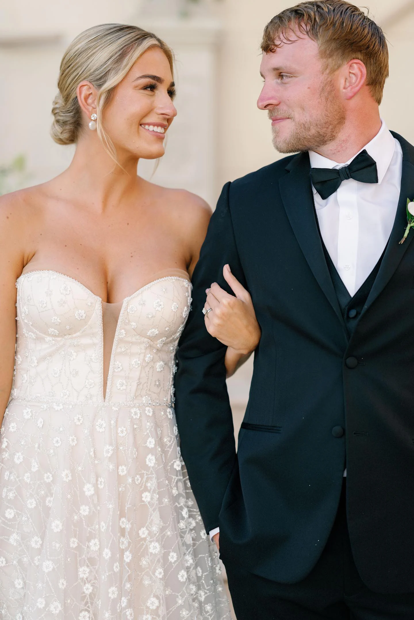 Bride and groom in a formal garden wedding portrait